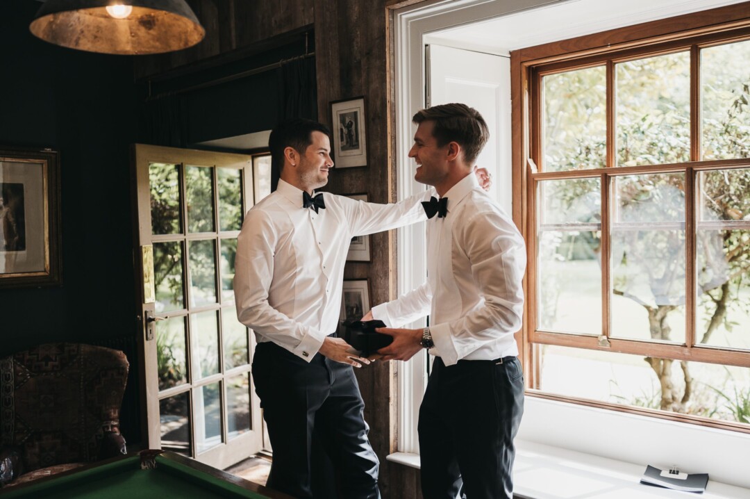 Groomsmen getting ready in The Court Room