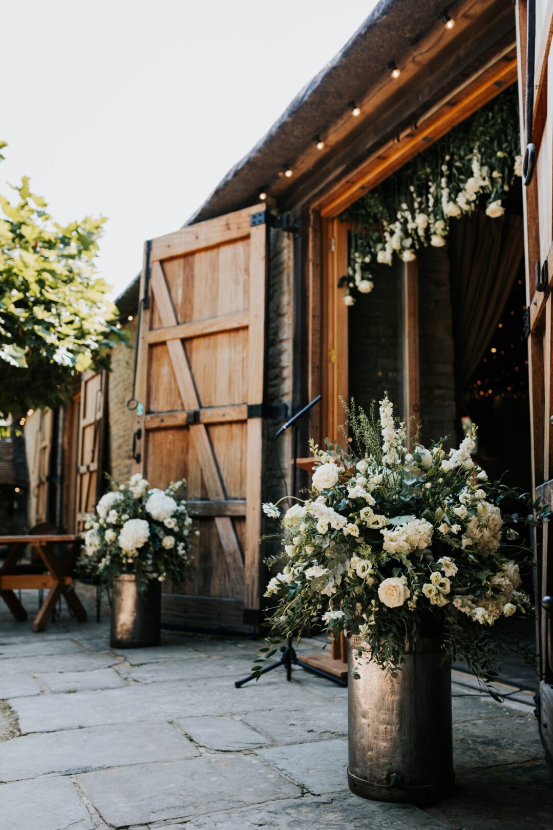 Flower curtain backdrop for outdoor Sumer wedding ceremony